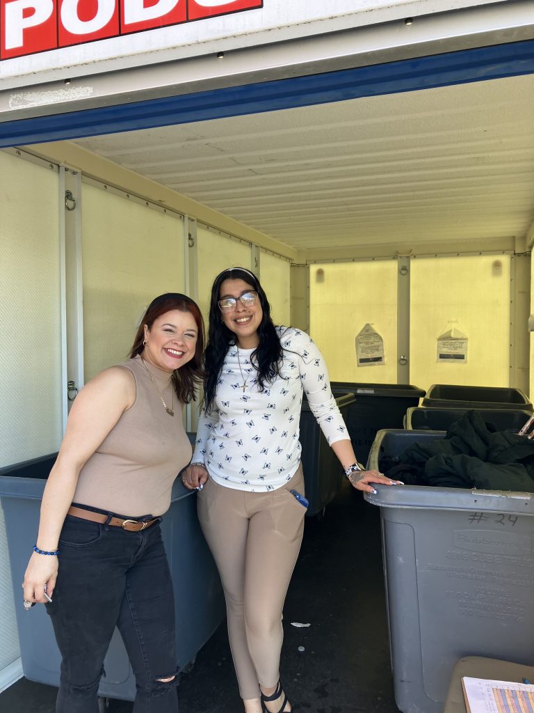Women from YWCA collecting donated items.